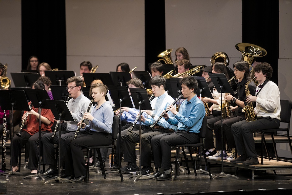 Members of UCSB Wind Ensemble playing on stage