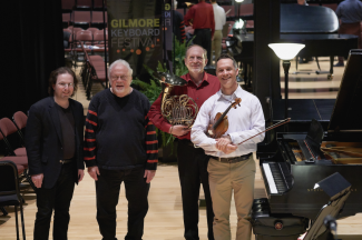 Pictured from left: pianist Constantine Finehouse, composer William Bolcom, Professor Steven Gross, and violinist Phil Ficsor in rehearsal at the Gilmore Festival.